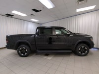 Remarkably capable, our 2022 RAM 1500 Rebel Crew Cab 4X4 is a terrific trail truck with a rugged Dia... (image 8)