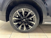 The 2024 Mazda CX-90 PHEV GT in a stunning black finish offers the perfect blend of luxurious style... (image 9)