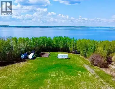 Lakefront-Great Location! Over one acre property is a great location for building or for getaway at...