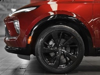 The 2024 Buick Envision Sport Touring (ST) is a premium compact SUV that received a significant refr... (image 9)