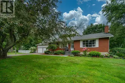 Welcome to this spacious 4-bedroom, 3-bathroom all-brick bungalow, situated on a quiet street, in a...