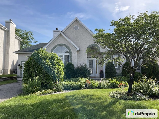 $748,500 - Bungalow for sale in Boisbriand — photo 1