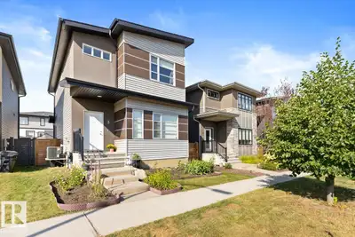 Bright, open-concept main floor built for everyday living and easy entertaining. The sleek kitchen f...