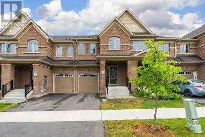 Welcome to this exceptional all-brick freehold townhome, perfectly positioned on a premium ravine lo...