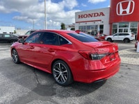 Experience the thrill of driving the 2023 Honda Civic Sedan Touring, a certified pre-owned beauty wi... (image 6)