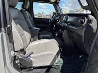 This Jeep Wrangler delivers a Gas/Electric V-6 3.6 L/220 engine powering this Automatic transmission... (image 9)