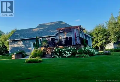 Welcome to 15 Myles Lane, Boom Road, a beautiful waterfront bungalow set on almost 3 acres of privat...