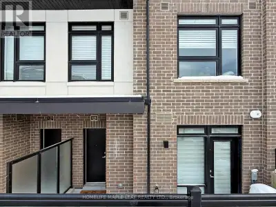 Modern living awaits in this bright 2 bedroom, 2 bathroom stacked townhome at 1569 Rose Way, Unit 12...
