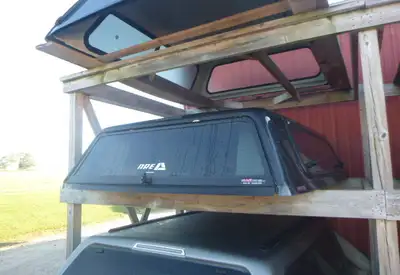 Chevrolet Silverado 2019 - 2026 Chevrolet Silverado 1500 6'6 GJI Dark Shadow ARE Truck Cap This unit...