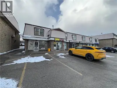 This unit has two front doors. Presently set up as a accountants office. Most retail uses permitted....