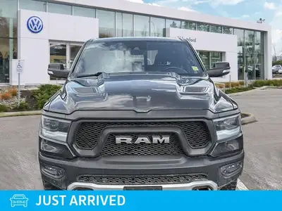 Conquer any challenge with absolute confidence in this formidable 2021 Ram 1500 Rebel Crew Cab Picku...