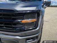 Introducing the sophisticated 2024 Ford F-150 XLT in a pristine white finish with a 4 4 drivetrain a... (image 7)