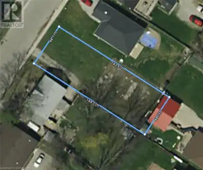 Prime building lot with plans for a pair of affordable, semi-detached homes! Located in the quiet to...