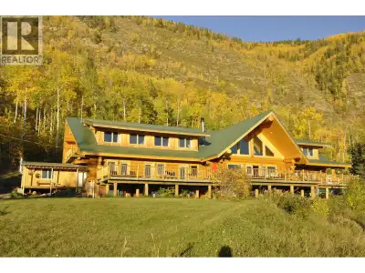 Discover your dream home on Williston Lake with this remarkable 103-acre estate surrounded by untouc...