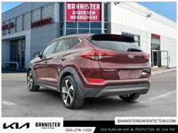 Experience the 2016 Hyundai Tucson Ultimate in its striking red exterior, offering the confidence of... (image 3)