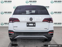 The 2024 Volkswagen Taos Highline, finished in a pristine white, comes equipped with an all-wheel-dr... (image 5)