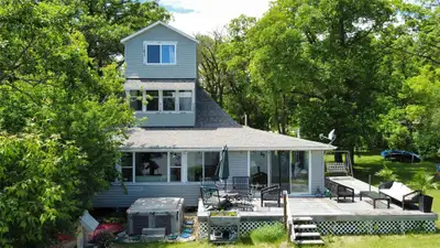 R26//Whytewold/Turn back the calendar to a bygone era with this historic lakefront cabin. Spectacula...