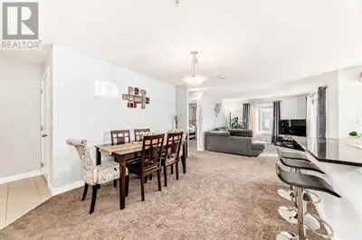 Welcome to this stunning second-floor CORNER UNIT in the sought-after community of Legacy. With wind...