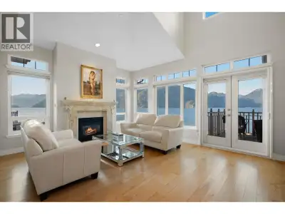 True WATERFRONT living at #7 Olivers Landing! This end-unit townhome offers approximately 3600sf of...