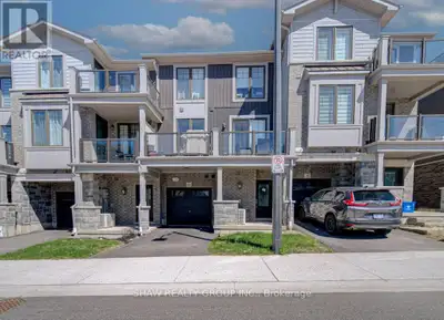 Welcome to this well-maintained stacked townhouse in the heart of Cambridge. This bright and functio...