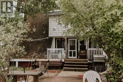 Escape to the lake and enjoy sunshine all day long in this cozy 3-season A-frame cabin nestled on th...