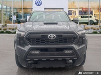 **Master any terrain with confidence** in this formidable 2024 Toyota Tacoma Crew Cab Pickup. With j... (image 7)