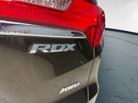 The 2015 Acura RDX in striking AWD configuration boasts an impressive handling prowess. This sophist... (image 7)
