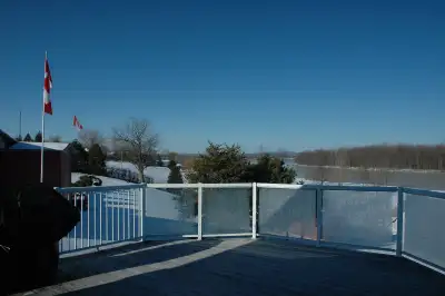 Used white Regal railing in good condition. Combination tempered glass and pickets. Decking has been...