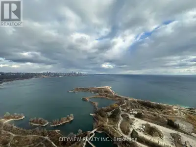 Enjoy stunning unobstructed south views of the lake and cn tower views from your balcony!! Much soug...