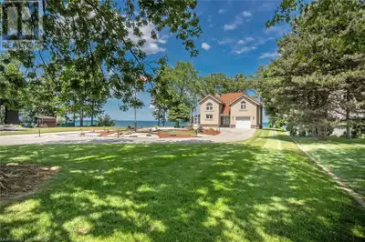 Nestled on a historic private road along the shores of Lake Ontario, this exceptional waterfront pro...