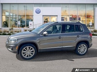Gaze up through the expansive panoramic roof of this stunning 2017 Volkswagen Tiguan Comfortline. Ba... (image 1)