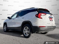 Experience the capable performance of the 2024 GMC Terrain SLE, a striking white Sport Utility ready... (image 3)