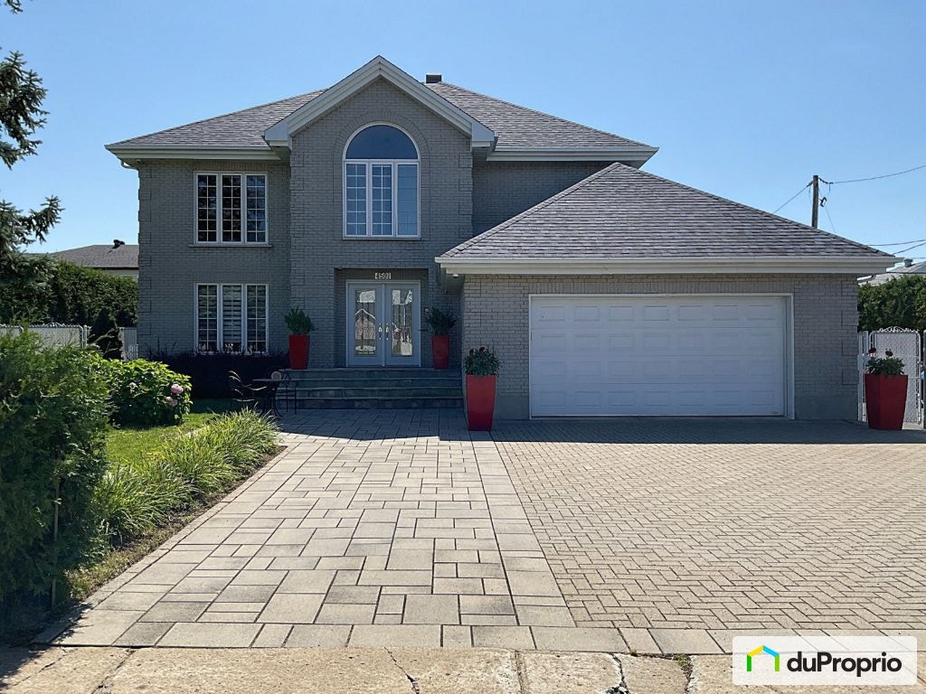 $1,975,000 - Bungalow for sale in Chomedey — photo 1