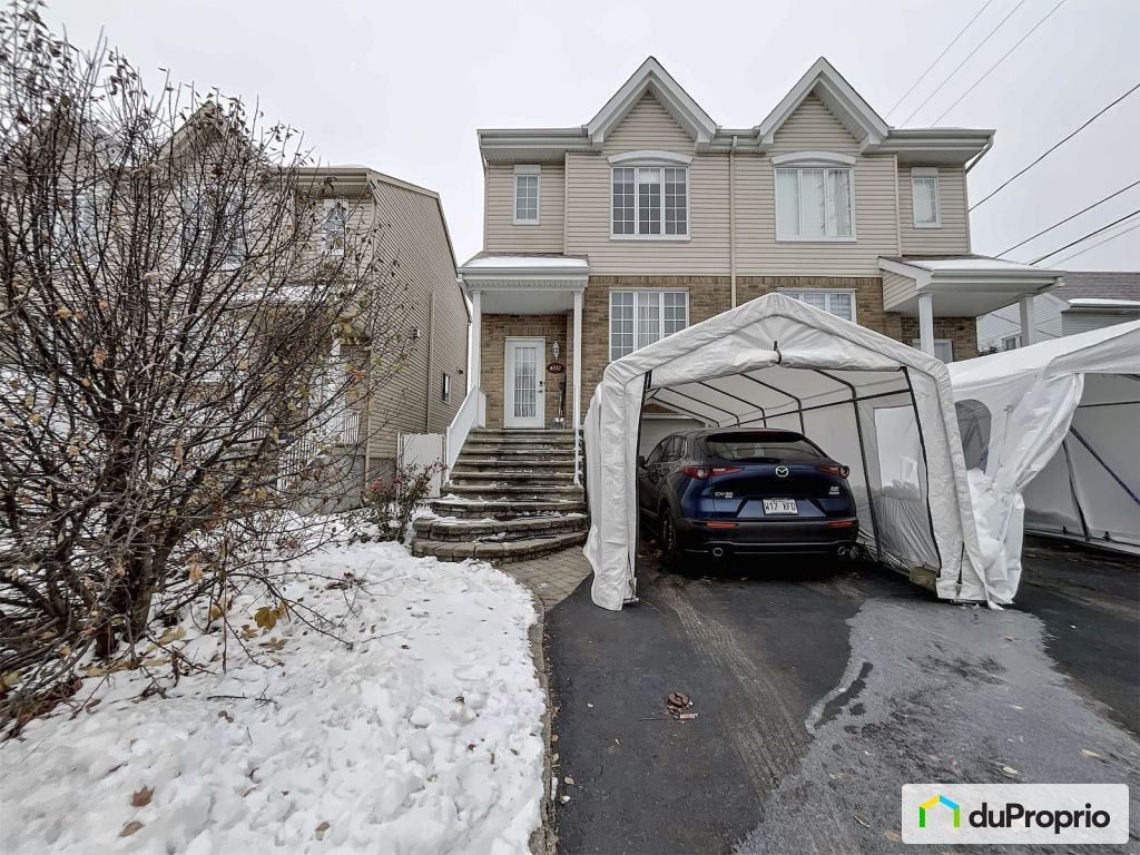 $589,000 - Semi-detached for sale in Laval-Ouest — photo 1
