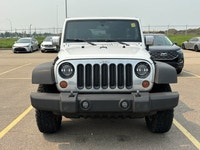 3.6L V6 engine with manual transmission - 4x4 drive for all-terrain capability - Cloth interior with... (image 2)