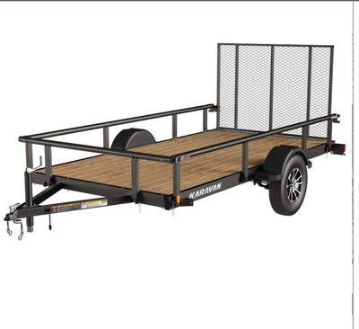 6x12 utility trailer,ramp , sides fold down, spare tire , tool box Bought new in 2023. It has maybe...