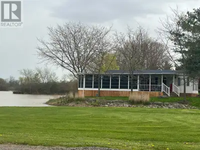 Waterfront Seasonal Mobile Home. Prime park location. One level, 500SqFt home plus 300SqFt enclosed...