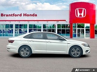 Embrace a more connected and efficient journey with the 2019 Volkswagen Jetta Highline, designed to... (image 7)