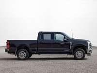 This Ford Super Duty F-350 SRW boasts a Intercooled Turbo Diesel V-8 6.7 L/406 engine powering this... (image 6)