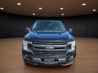 The 2018 Ford F-150 XL in Black is a robust 4x4 truck that combines power with agility, delivering a... (image 1)