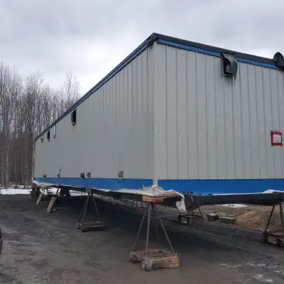Two new ones 12x56 sanitary block, 6 showers, 4 toilets, 2 urinals, 100-gallon water heater, central...