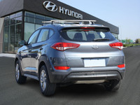 The 2018 Hyundai Tucson Premium FWD is a compact SUV that offers a perfect blend of modern design, a... (image 6)