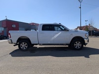 This pre-owned 2022 Ram 2500 Big Horn Crew Cab offers a clean and commanding look with its Bright Wh... (image 7)