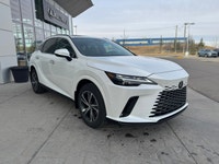 Curbside, this 2026 Lexus RX350h Premium expresses its sophisticated style with a sleek body design... (image 3)