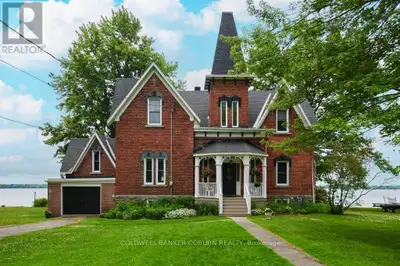 THE CENTENNIAL COTTAGE at 81 Lakeshore Drive, Morrisburg is a rare Victorian-era brick residence com...