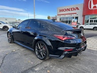 Heated front sport seats, heated steering wheel, and a 10.2-inch Acura Driver Information Interface... (image 6)