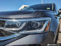 Step into the world of refinement and versatility with the 2022 Volkswagen Taos Highline 4MOTION. Cl... (image 8)