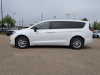 The 2026 Chrysler Grand Caravan SXT in Bright White with a Black interior offers the perfect blend o... (image 2)