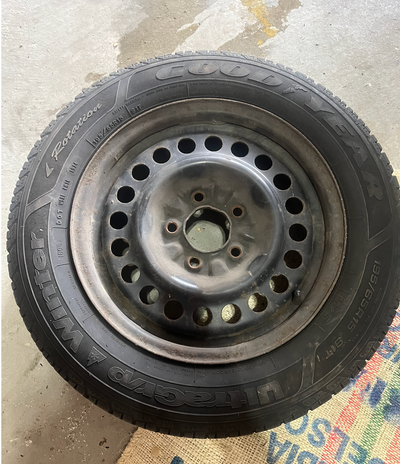 Set of 4 Goodyear Ultra Grip winter tires, size 195/65R15, mounted on 15” steel rims. Tires and rims...
