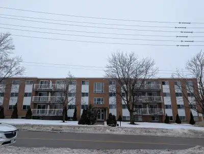 SPACIOUS TWO BEDROOM UNIT WITH BALCONY Well kept four storey walk up with outdoor parking This prope...
